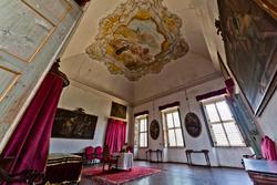 one of the bedrooms internal of the ventian villa, the red chamber